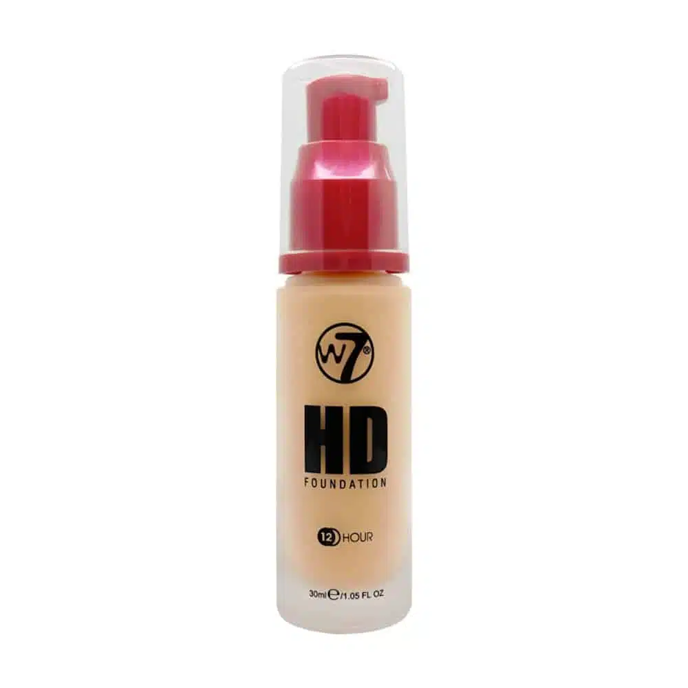 W7 Honey HD Foundation 30ml in a clear glass bottle with black pump, front view. - thumbnail