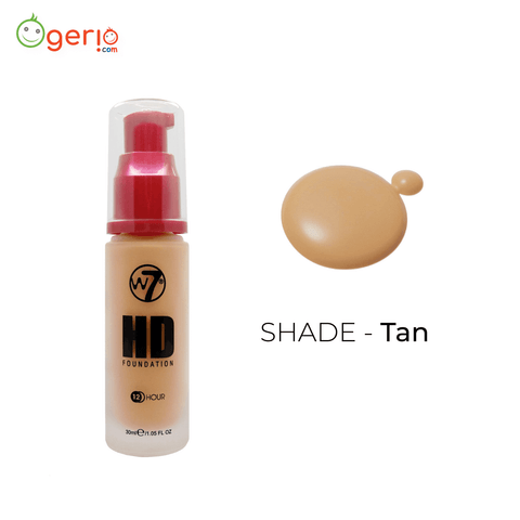 W7 HD Foundation Tan, elegant clear glass bottle with black pump dispenser, standing upright.