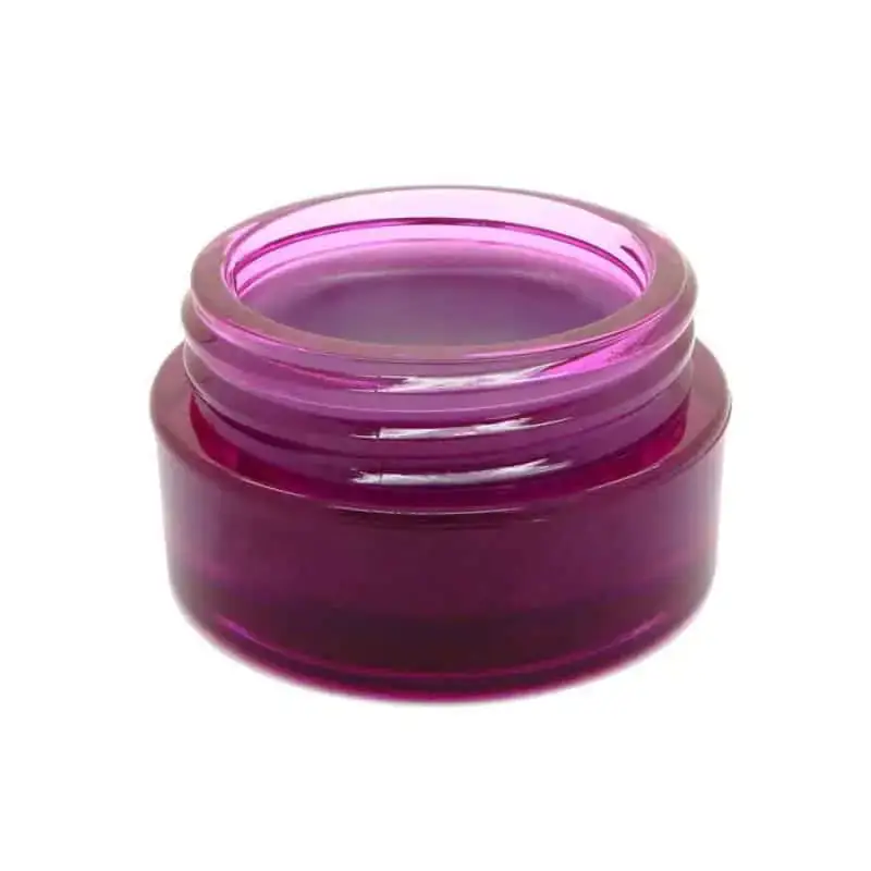 Open W7 Jelly Crush Lip Scrub jar, revealing pink jelly texture and fingertip swatch. - thumbnail