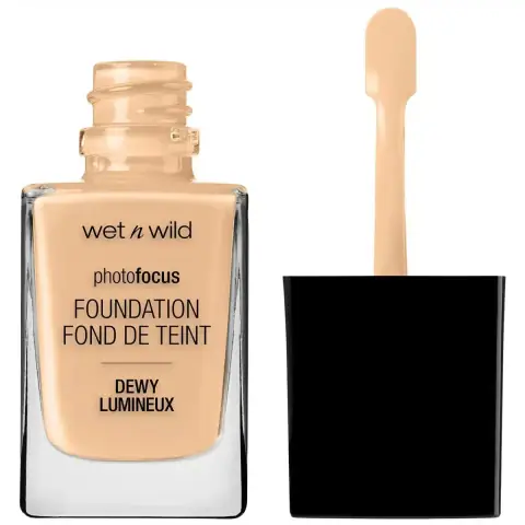 Wet N Wild PhotoFocus Dewy Foundation Soft Beige in clear glass bottle with black pump.