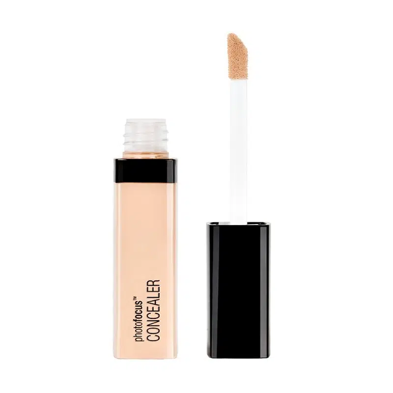 Wet N Wild Photo Focus Concealer tube in Light Ivory, clear body with white cap, displayed upright.