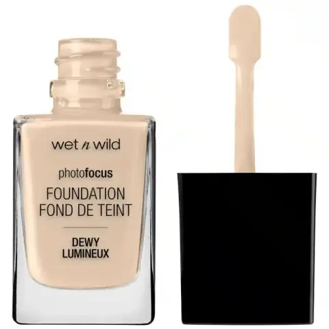 Wet N Wild Photo Focus Dewy Foundation Nude Ivory, clear glass bottle with black pump cap.