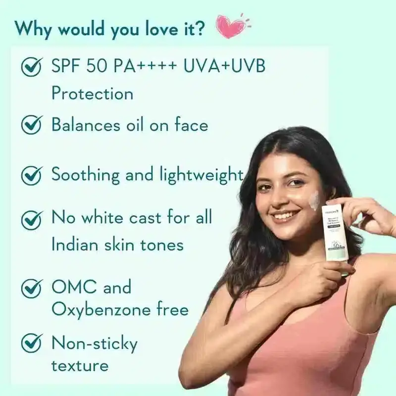 WishCare Niacinamide Oil Balance Fluid Sunscreen bottle held in hand, ready for use outdoors. - thumbnail