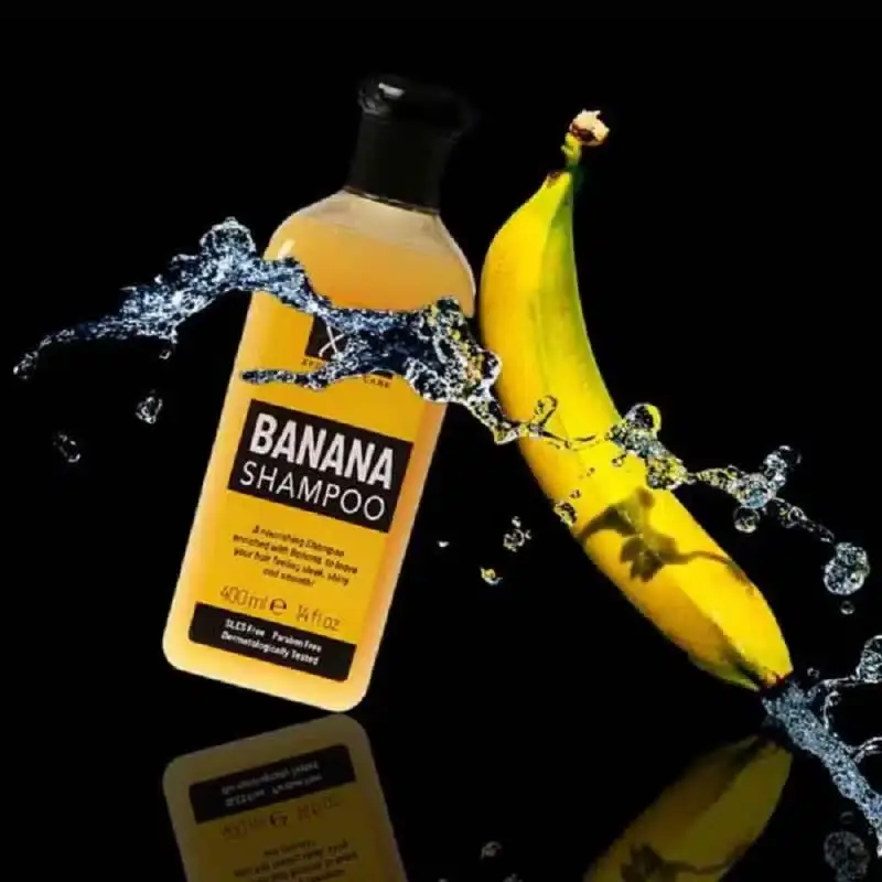 XPEL Banana Shampoo 400ml yellow bottle close-up, highlighting detailed product label information. - thumbnail