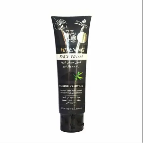 Yc Products Whitening Face Wash tube, black with green and white text, standing upright.