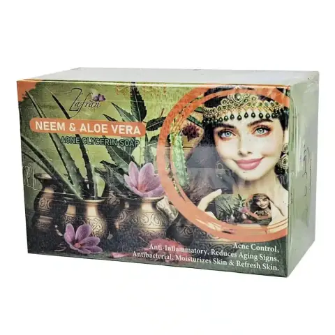 Green Zafran Neem & Aloe Vera 100gm glycerin soap bar next to its white and green box.